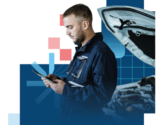 Car mechanic holding mobile phone